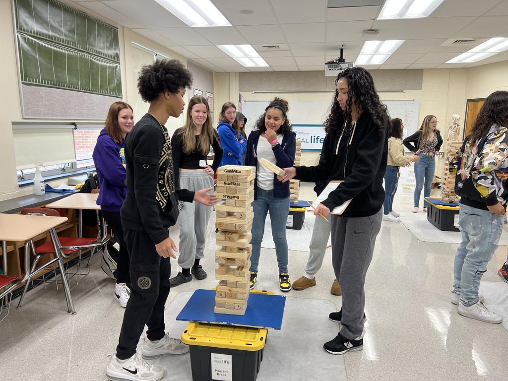 Students playing interview tip jenga