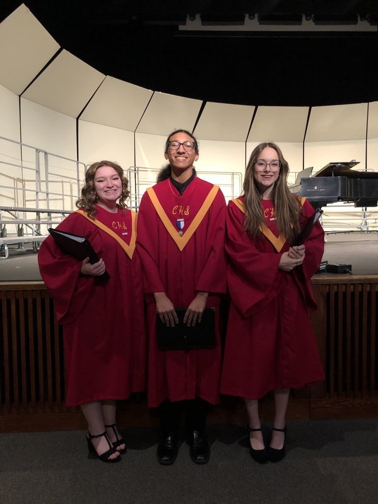 Three Students in Choir Robes